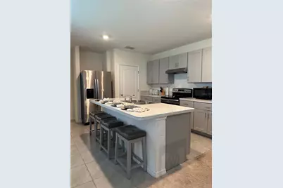 1989 Egret Meadows Avenue, Kissimmee, FL 34744 - Photo 4