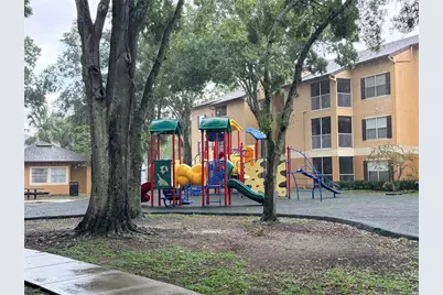 7606 Pissarro Drive #105, Orlando, FL 32819 - Photo 2