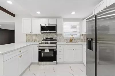 7620 Dennison Drive, Tampa, FL 33619 - Photo 10