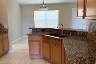 1404 Punta Gorda Dr, Poinciana, FL 34759 - Photo 4