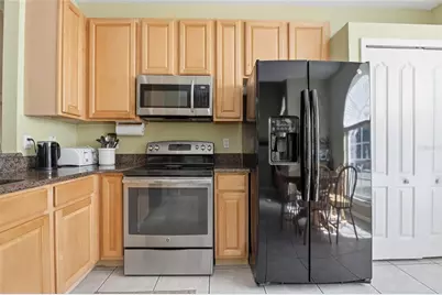 7733 Beridale Court, Orlando, FL 32818 - Photo 6