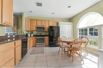 7733 Beridale Court, Orlando, FL 32818 - Photo 4