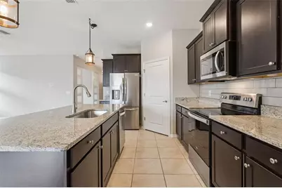 8016 Penrose Place, Wildwood, FL 34785 - Photo 4