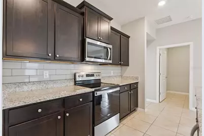 8016 Penrose Place, Wildwood, FL 34785 - Photo 24