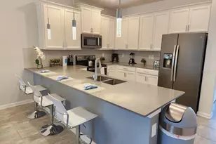 8885 Cabot Cliffs Dr, Champions Gate, FL 33896 - Photo 4