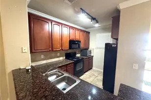 909 Charo Pkwy, Davenport, FL 33897 - Photo 2