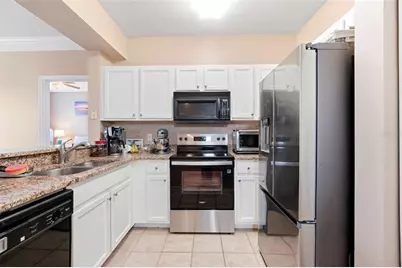 12837 Madison Pointe Circle #208, Orlando, FL 32821 - Photo 6