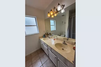 7736 Rollingridge Court, Orlando, FL 32835 - Photo 24