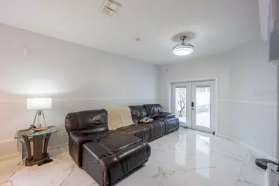 8915 Victoria Isle Place, Orlando, FL 32829 - Photo 18