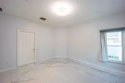 8915 Victoria Isle Place, Orlando, FL 32829 - Photo 26