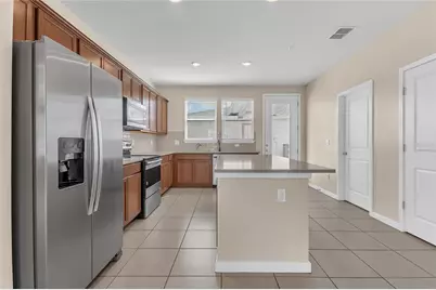 9744 Brown Burrow Street, Orlando, FL 32829 - Photo 10