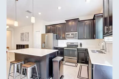 2938 Satire Street, Kissimmee, FL 34746 - Photo 10