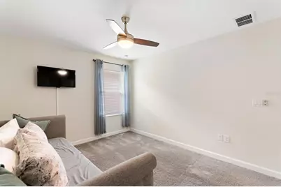 8809 Beth Page Ln, Champions Gate, FL 33896 - Photo 16