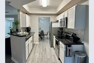 6440 Axeitos Terrace #106, Orlando, FL 32835 - Photo 20