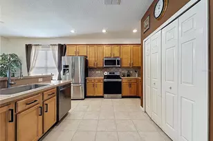 344 Orange Cosmos Blvd, Davenport, FL 33837 - Photo 18