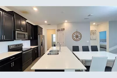 8817 Beth Page Lane, Champions Gate, FL 33896 - Photo 10