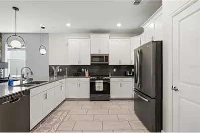 917 Ocean Course Avenue, Champions Gate, FL 33896 - Photo 36