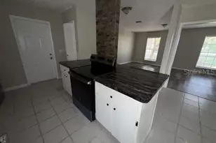 1334 Stately Oaks Dr NW, Winter Haven, FL 33881 - Photo 4