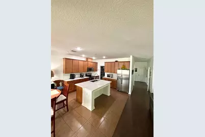 1034 Bella Vida Boulevard, Orlando, FL 32828 - Photo 14