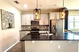 5608 Blowing Wind Pl, Saint Cloud, FL 34771 - Photo 4