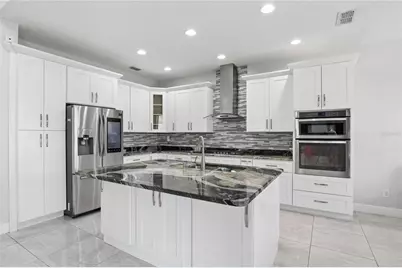 10142 Silmarien Street, Orlando, FL 32825 - Photo 6