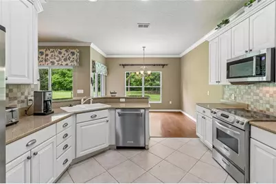 136 Sorrento Rd, Poinciana, FL 34759 - Photo 18