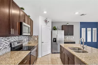 1959 Cacutta Way, Kissimmee, FL 34744 - Photo 16