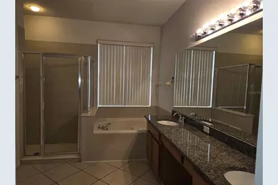 8423 Baywood Vista Drive, Orlando, FL 32810 - Photo 24