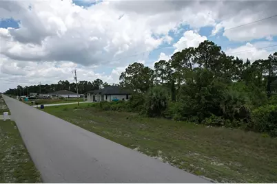 1056 Jaguar Boulevard, Lehigh Acres, FL 33974 - Photo 2