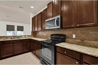 9301 Watchet Way, Orlando, FL 32825 - Photo 12