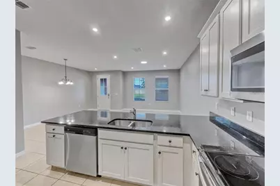 2424 Blowing Breeze Avenue, Kissimmee, FL 34744 - Photo 10