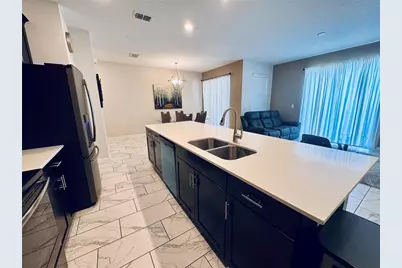 1555 Sandbagger Drive, Champions Gate, FL 33896 - Photo 12