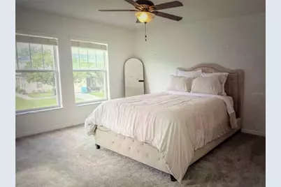 9734 Tiramasu Trail, Orlando, FL 32829 - Photo 4