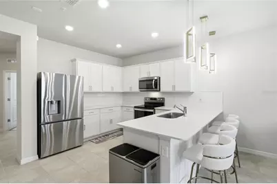 6942 Reverie Park Avenue, Orlando, FL 32829 - Photo 12
