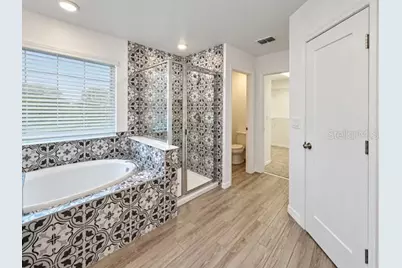 2436 Blowing Breeze Avenue, Kissimmee, FL 34744 - Photo 18