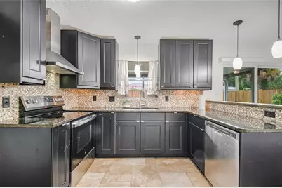 4931 Tellson Place, Orlando, FL 32812 - Photo 12