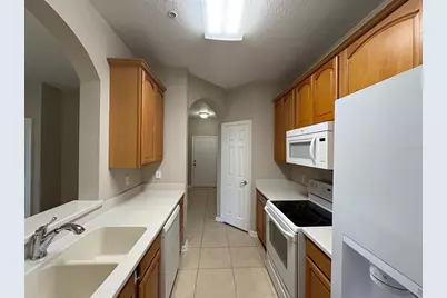 3314 Robert Trent Jones Drive #406, Orlando, FL 32835 - Photo 12