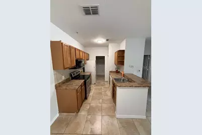 6151 Metrowest Boulevard #103, Orlando, FL 32835 - Photo 6