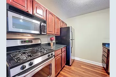 2065 Dixie Belle Drive #M, Orlando, FL 32812 - Photo 18