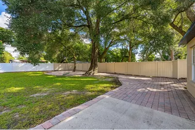 7918 Lakeside Woods Drive, Orlando, FL 32810 - Photo 14