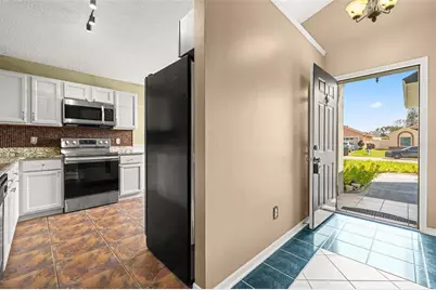 11830 Sindlesham Court, Orlando, FL 32837 - Photo 2