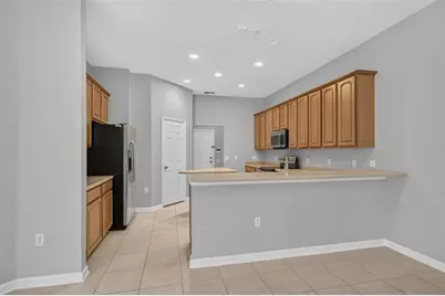 2213 Wandering Oak Terrace, Kissimmee, FL 34746 - Photo 18