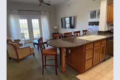 7637 Heritage Crossing Way #302, Reunion, FL 34747 - Photo 12