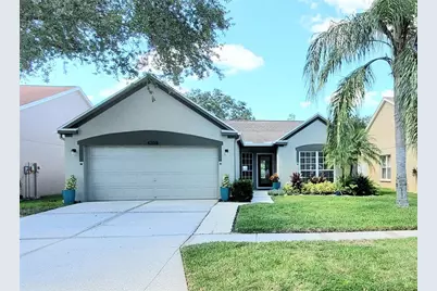 4208 Pine Isle Drive, Lutz, FL 33558 - Photo 1