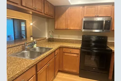 2765 Countryside Boulevard #106, Clearwater, FL 33761 - Photo 4