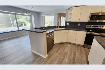 2113 E Del Webb Boulevard, Sun City Center, FL 33573 - Photo 6