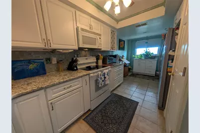 9510 Harbor Greens Way #406, Seminole, FL 33776 - Photo 6