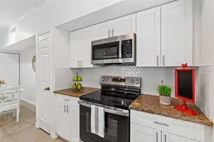 9268 Lake Chase Island Way, Tampa, FL 33626 - Photo 8