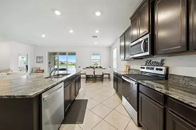 8674 Bower Bass Circle, Wesley Chapel, FL 33545 - Photo 12