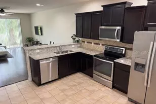 8723 Turnstone Haven Pl, Tampa, FL 33619 - Photo 2